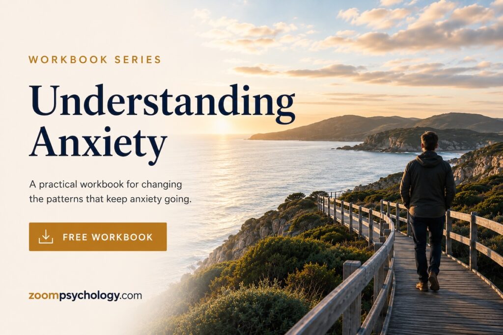 Man walking along a coastal boardwalk near Albany, Western Australia, for the Understanding Anxiety workbook.